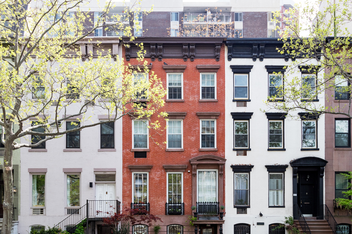 Row of historic buildings along 30th Street in Manhattan, New York City NYC