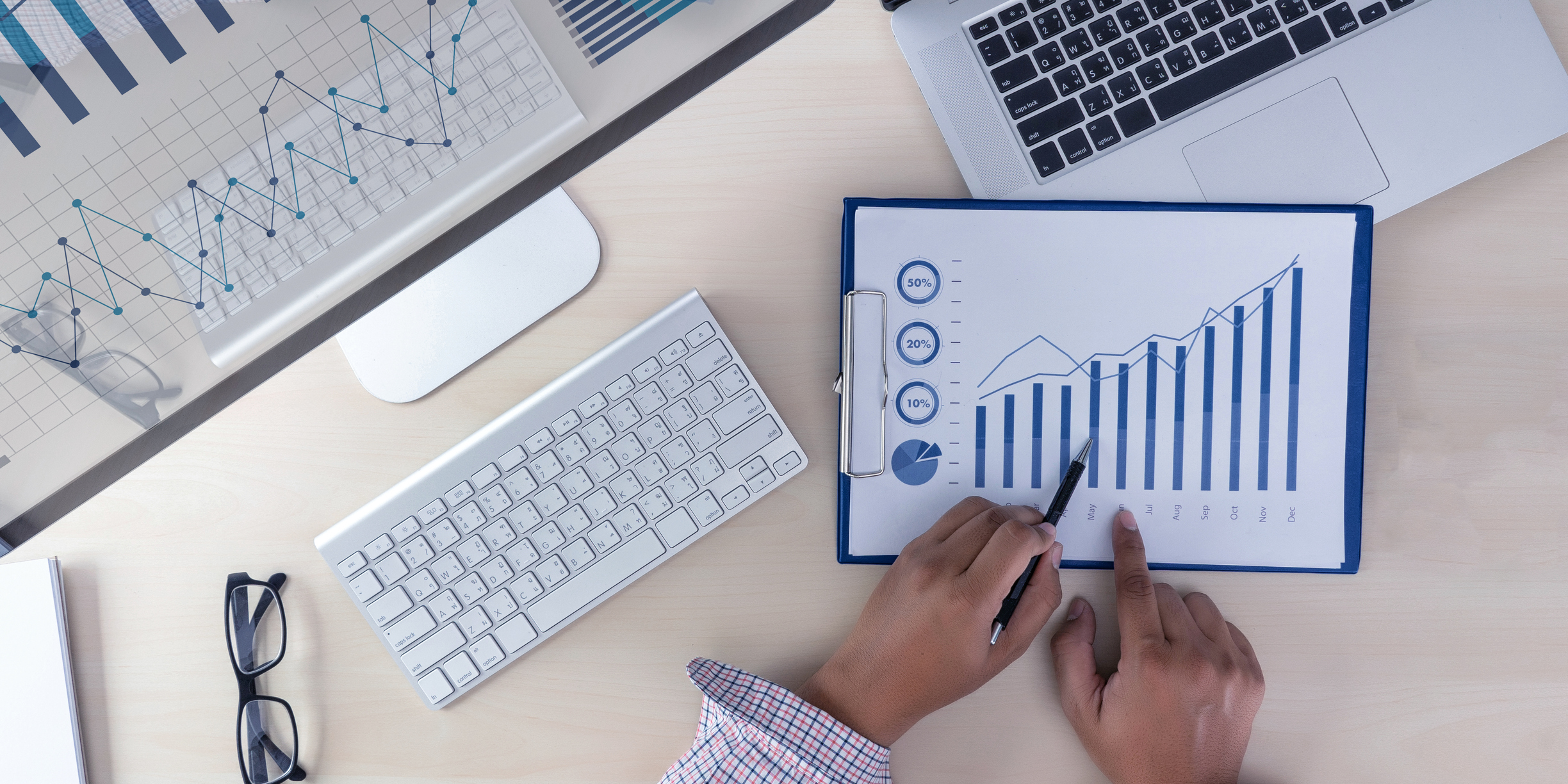 analyzing the work Accounting on Laptop investment concept.