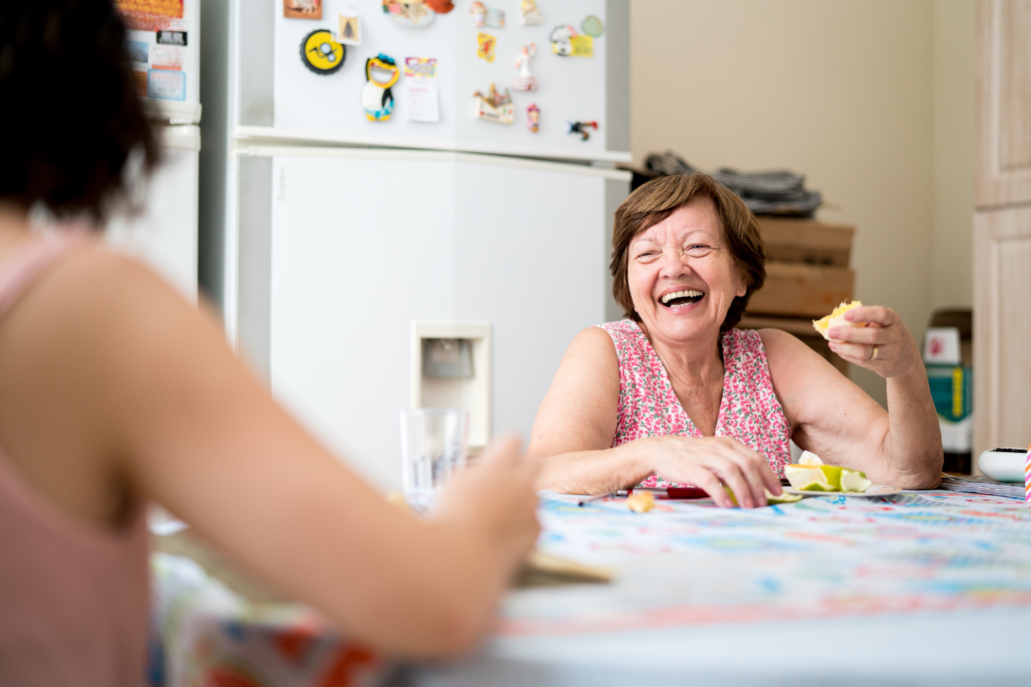 Mother and daughter enjoying a great time together in the kitchen