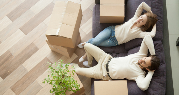 Couple moving into apartment.