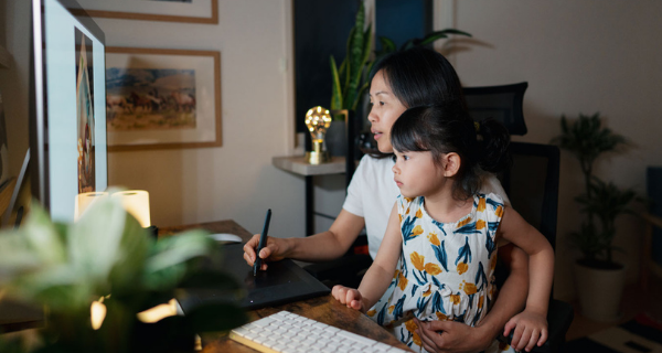 Mom and daughter on computer