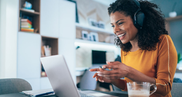 Woman working from home on video call.