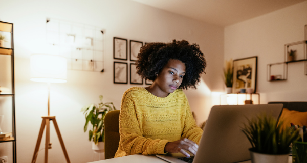 Woman using computer from home