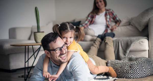 Family playing in their living room.